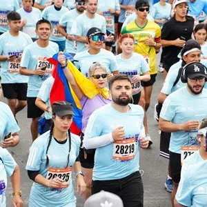 Participantes disfrutan la jornada deportiva de la Media Maratón.
